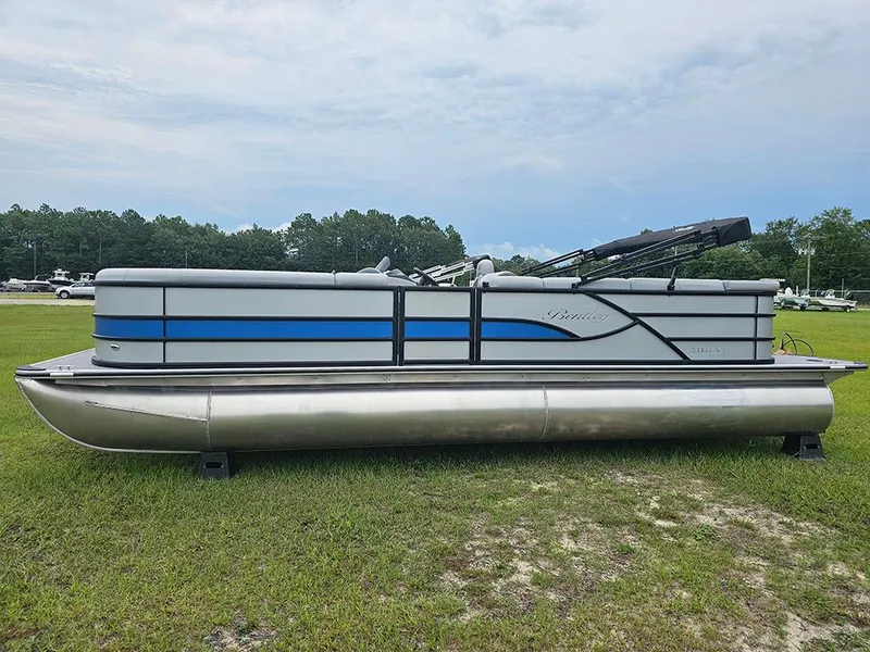 Slide: The Image of 2026 Bentley Pontoons Legacy 243 Cruise on grass, featuring sleek design and modern amenities. - 6