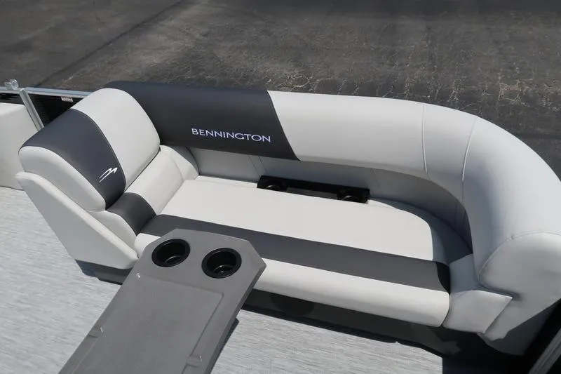 Slide: The Image of 2026 Bennington S Quad Bench 22 SSR with sleek seating and integrated cup holders. - 15