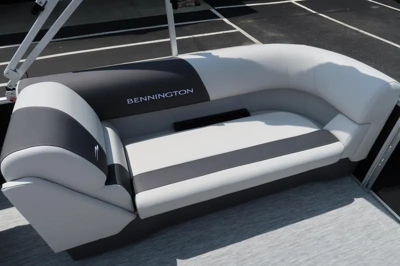 Slide: The Image of 2026 Bennington S Quad Bench 22 SSR boat seating, featuring sleek gray and black upholstery. - 21