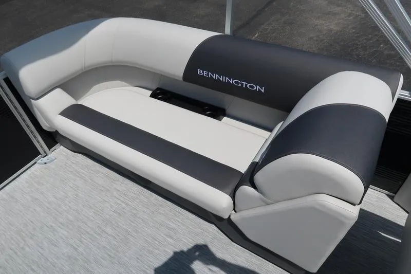 Slide: The Image of 2026 Bennington S Quad Bench 22 SSR, luxury boat seating in black and white. - 23