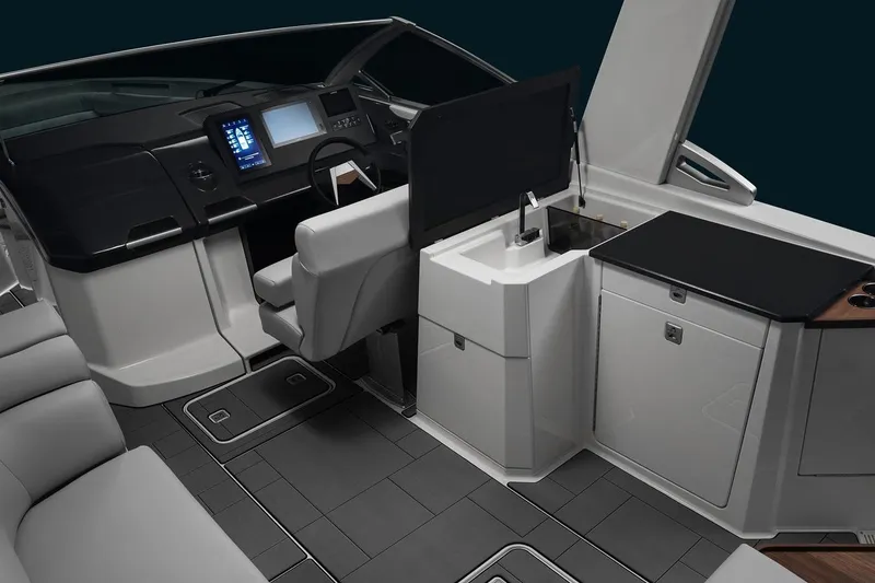 Slide: The Image of Manufacturer Provided Image: 2023 Aviara AV32 I/O boat interior with modern helm and kitchenette. - 8