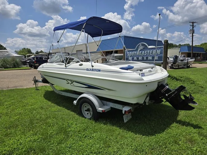 Slide: The Image of 2004 Glastron SX 195 boat on trailer at Southeastern Marine dealership. - 4