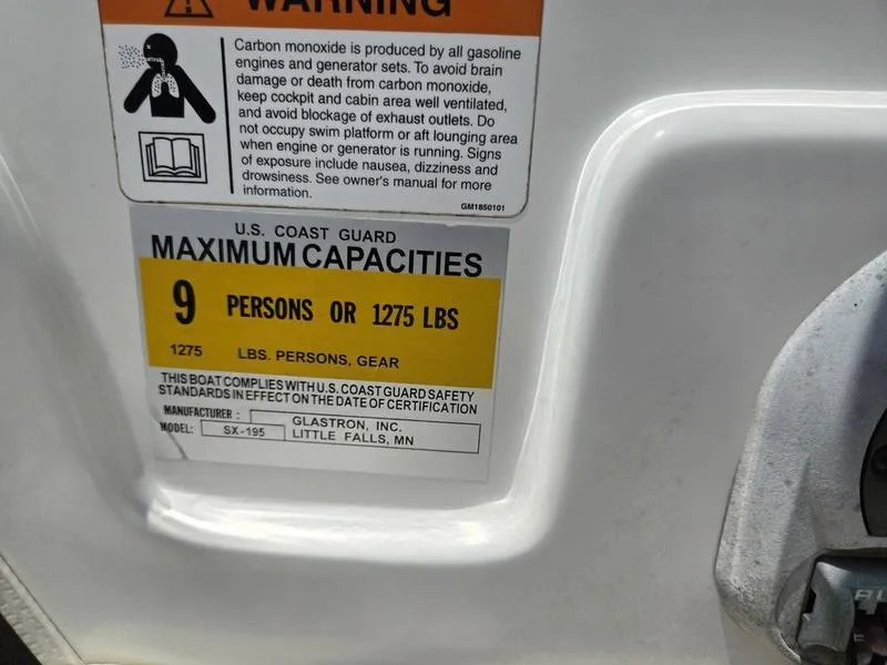 Slide: The Image of 2004 Glastron SX 195 capacity label, warning for 9 persons or 1275 lbs. - 8