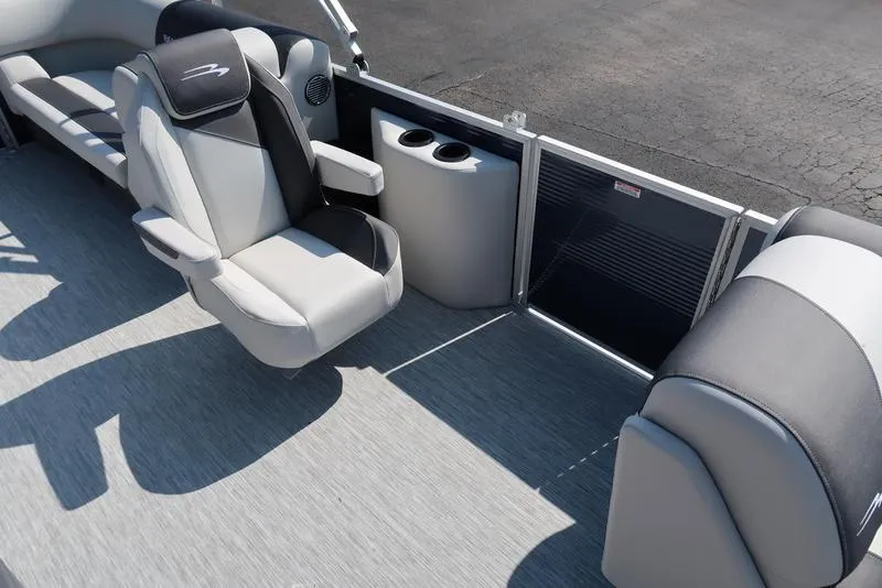 Slide: The Image of 2026 Bennington S Quad Bench 22 SSR boat seating, featuring sleek gray and black upholstery. - 18