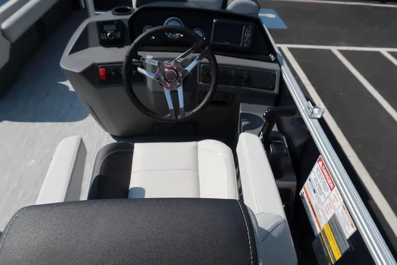 Slide: The Image of Control panel of a 2026 Bennington S Quad Bench 22 SSR with Bluetooth functionality. - 22