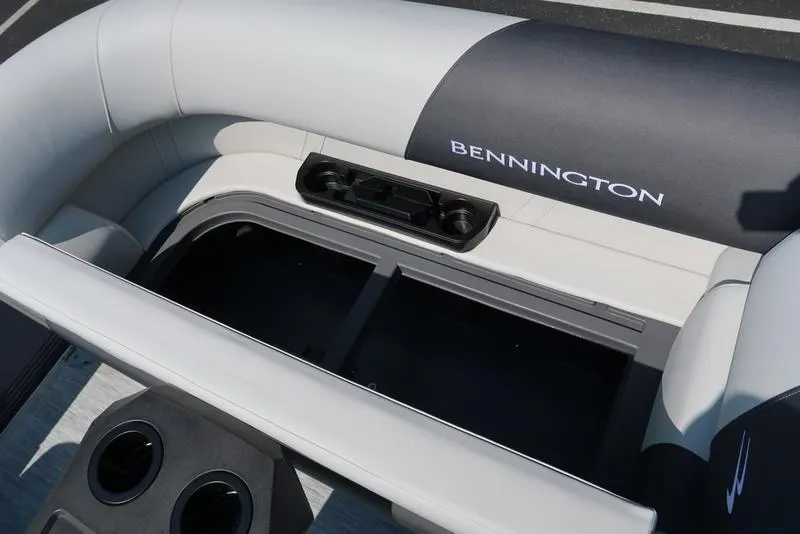 Slide: The Image of Control panel of 2026 Bennington S Quad Bench 22 SSR with safety warnings and fire extinguisher. - 24