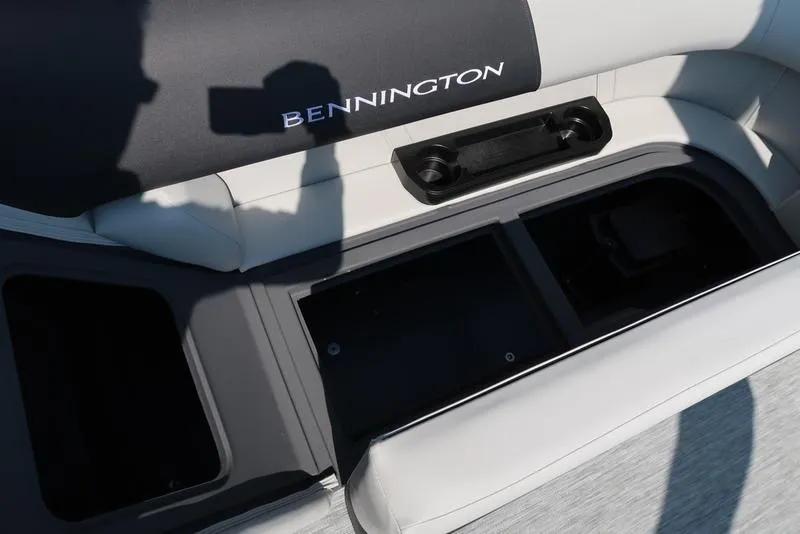 Slide: The Image of Dashboard of 2026 Bennington S Quad Bench 22 SSR with gauges and controls. - 25