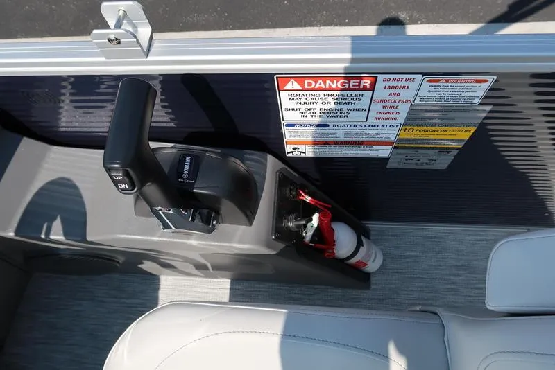 Slide: The Image of Interior view of 2026 Bennington S Quad Bench 22 SSR boat cockpit with steering wheel. - 29