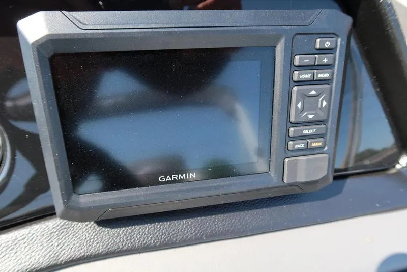 Slide: The Image of Bennington S Quad Bench 22 SSR 2026 boat seat with storage compartment and cup holders. - 31