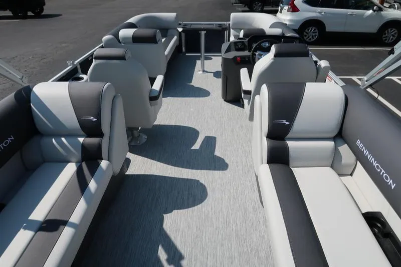 Slide: The Image of 2026 Bennington S Quad Bench 22 SSR interior detail with hinge and textured flooring. - 33