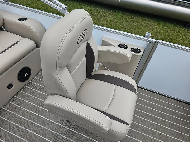 Slide: The Image of 2026 Bentley Pontoons 223 Legacy Swingback interior seating with storage compartments. - 17