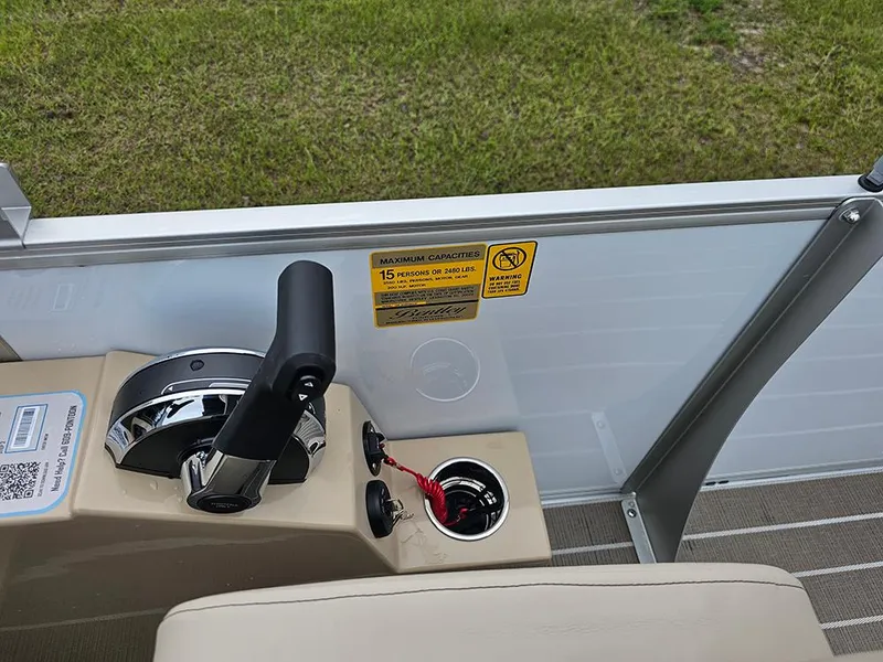 Slide: The Image of Luxurious seating on 2026 Bentley Pontoons 223 Legacy Swingback, featuring cup holders and premium upholstery. - 19