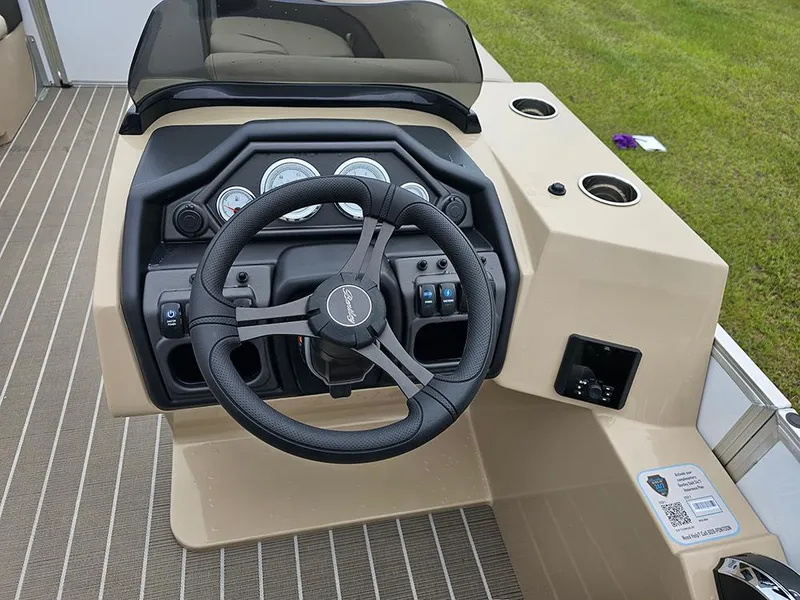 Slide: The Image of 2026 Bentley Pontoons 223 Legacy Swingback interior with luxurious seating and modern helm. - 20