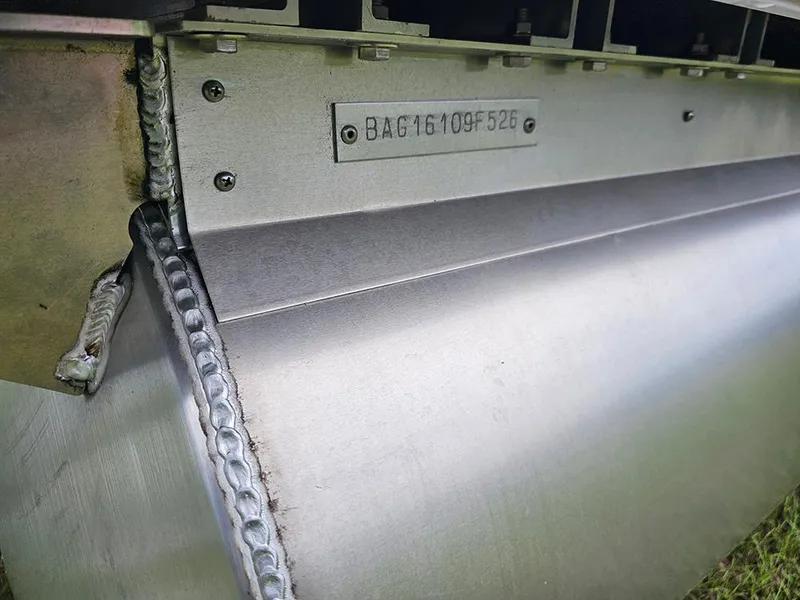 Slide: The Image of Close-up of 2026 Bentley Pontoons 223 Legacy Swingback metal weld and serial number plate. - 29