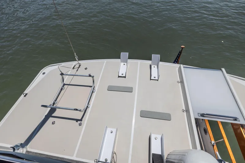 Slide: The Image of Grand Banks 46 Europa 2002 yacht deck with water view and equipment. - 19