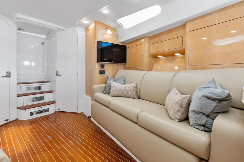 Slide: The Image of Luxurious interior of 2018 Intrepid 430 Sport Yacht with plush seating and modern amenities. - 36