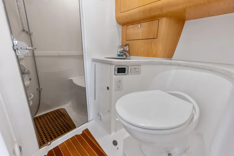 Slide: The Image of Bathroom interior of 2018 Intrepid 430 Sport Yacht with shower and toilet. - 42