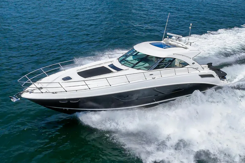 The Image of 2014 Sea Ray 540 Sundancer yacht cruising on open water. - 0