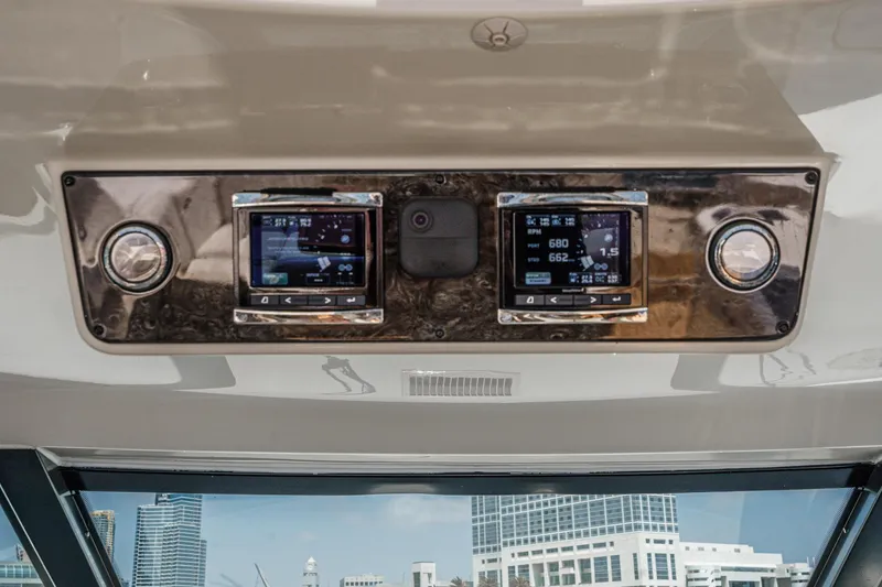 Slide: The Image of Control panel of 2014 Sea Ray 540 Sundancer yacht with digital displays. - 24
