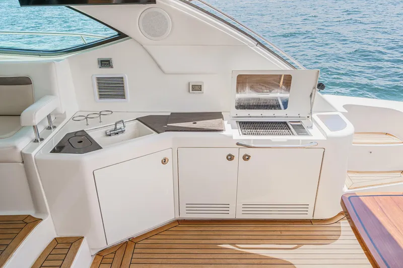 Slide: The Image of Luxurious outdoor kitchen on 2014 Sea Ray 540 Sundancer yacht with ocean view. - 27