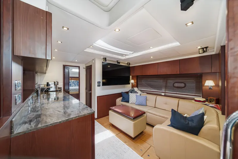 Slide: The Image of Luxurious interior of 2014 Sea Ray 540 Sundancer yacht with modern furnishings and elegant design. - 33