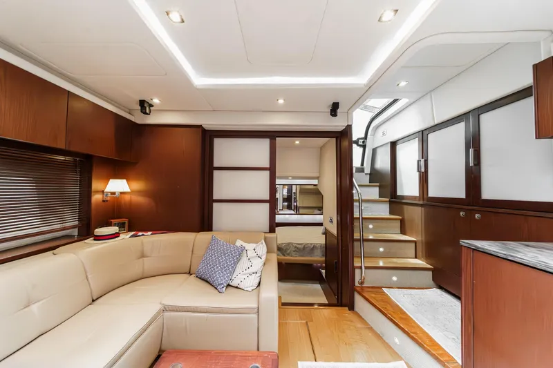Slide: The Image of Luxurious interior of 2014 Sea Ray 540 Sundancer yacht with elegant seating and modern design. - 35