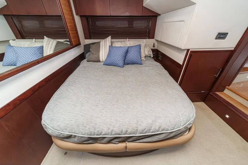 Slide: The Image of Luxurious cabin interior of 2014 Sea Ray 540 Sundancer yacht with cozy bedding. - 40