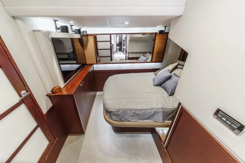 Slide: The Image of Luxurious cabin interior of 2014 Sea Ray 540 Sundancer yacht with elegant wood finishes. - 43