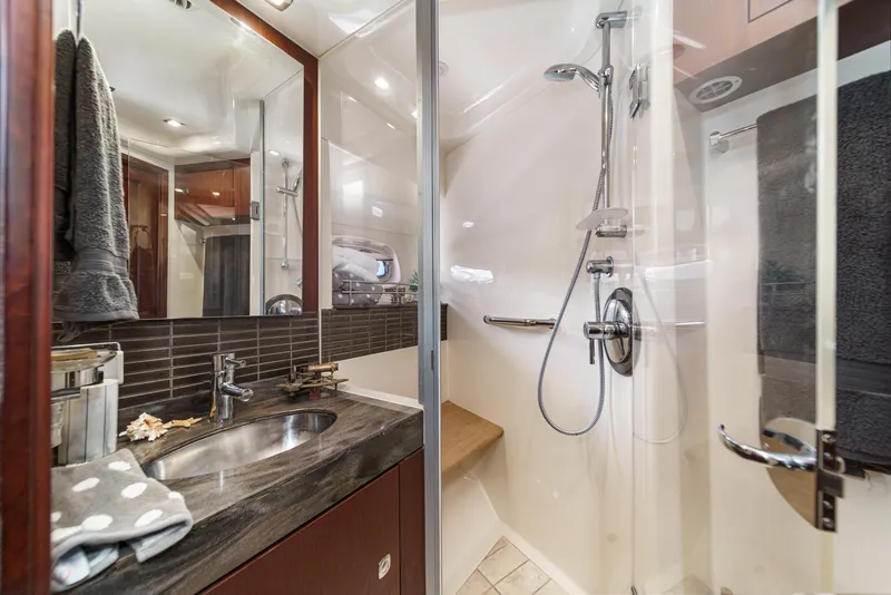 Slide: The Image of Luxurious bathroom in 2014 Sea Ray 540 Sundancer yacht with modern fixtures and elegant design. - 44