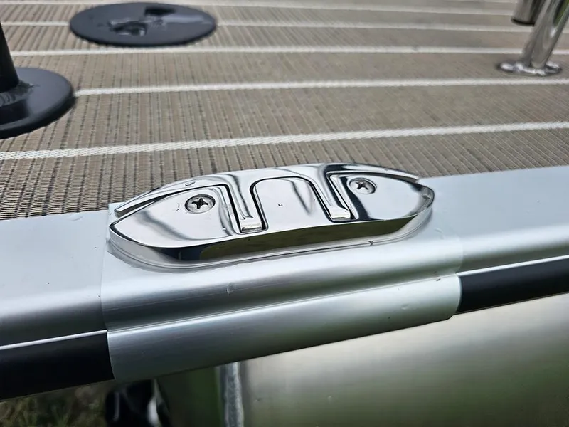 Slide: The Image of Close-up of a cleat on a 2026 Bentley Pontoons Elite 253 Tritoon deck. - 28