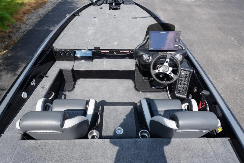 Slide: The Image of 2026 Phoenix 721 ZXL boat interior with dual seats and modern dashboard. - 11