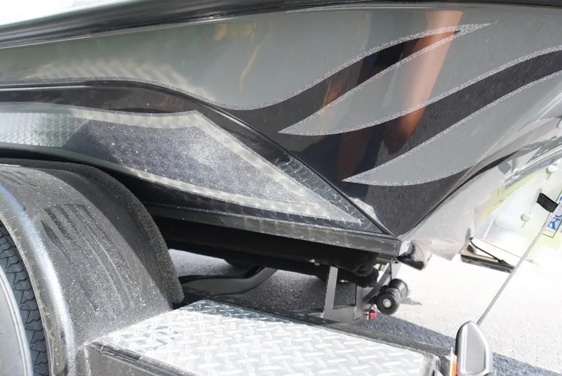 Slide: The Image of Close-up of 2026 Phoenix 721 ZXL boat trailer with sleek design and metallic accents. - 8