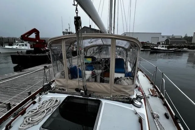 Slide: The Image of Sailboat docked at marina, Bristol 47.7 Cutter/Sloop, 1990 model, overcast sky. - 21