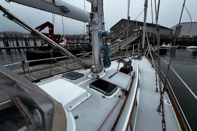 Slide: The Image of Sailboat docked at marina, Bristol 47.7 Cutter/Sloop, 1990 model, overcast day. - 25
