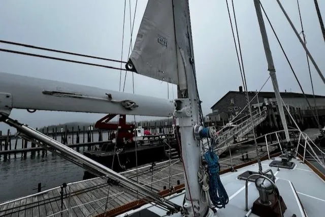 Slide: The Image of Sailboat docked at marina, Bristol 47.7 Cutter/Sloop, 1990 model, overcast sky. - 26