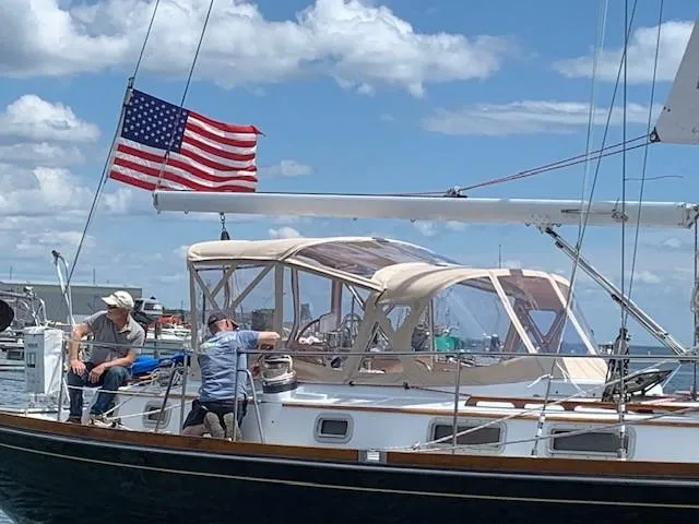Slide: The Image of Sailing on a 1990 Bristol 47.7 Cutter/Sloop with American flag, clear skies. - 39