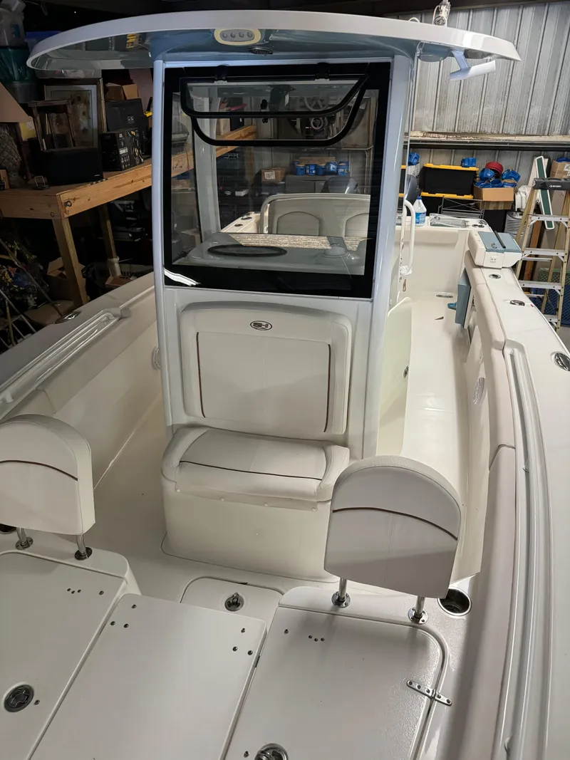 Slide: The Image of 2021 Sea Hunt Gamefish 27 boat interior in a storage facility. - 4