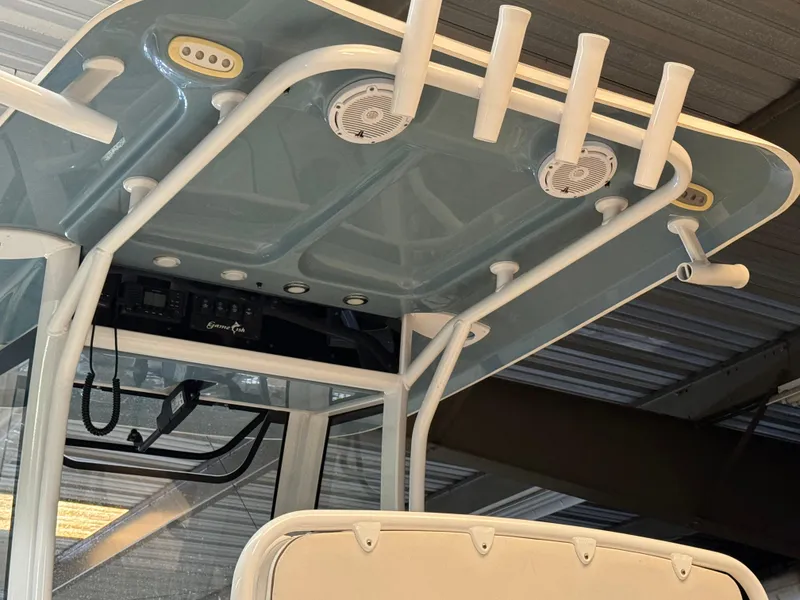 Slide: The Image of 2021 Sea Hunt Gamefish 27 boat with rod holders and speakers. - 7