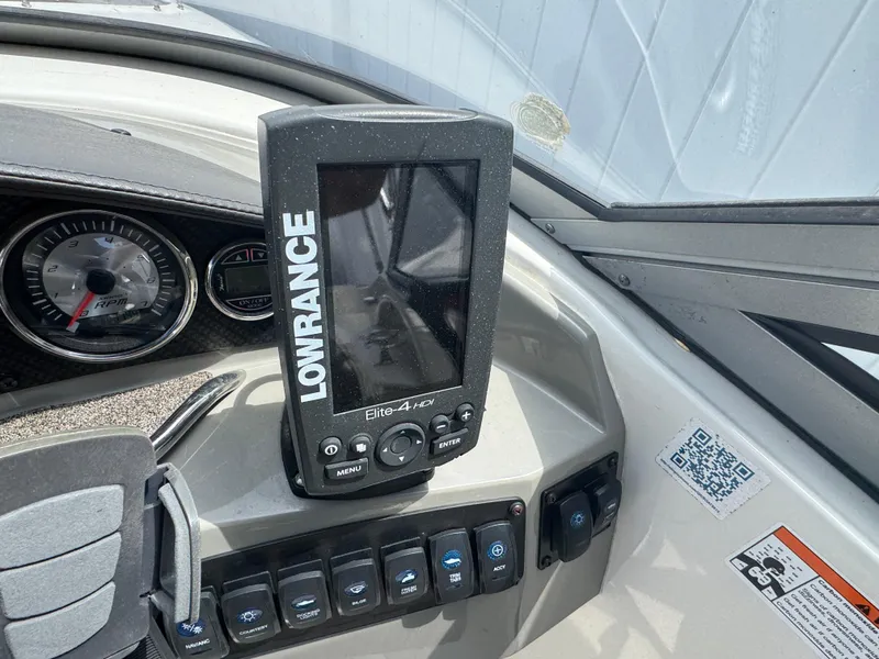 Slide: The Image of Lowrance Elite-4 HDI fishfinder on 2018 Stingray 234 LR boat dashboard. - 10