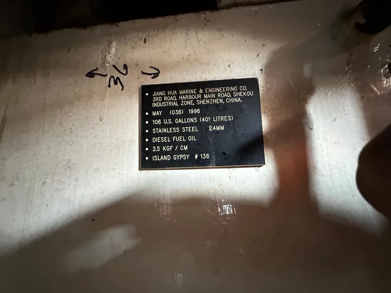 Slide: The Image of Plaque on 1996 Island Gypsy 36 Aft Cabin, detailing fuel capacity and specifications. - 44