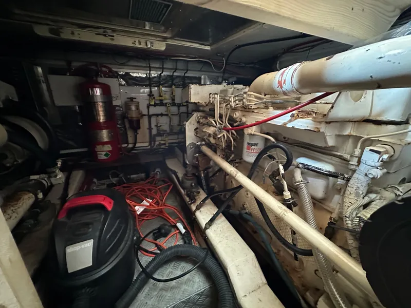 Slide: The Image of Engine room of 1996 Island Gypsy 36 Aft Cabin with visible machinery and equipment. - 45