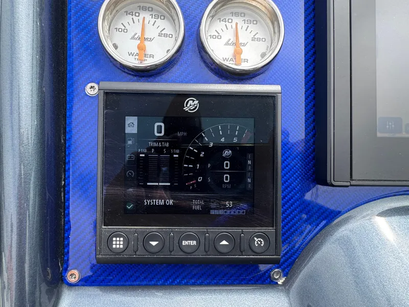 Slide: The Image of Dashboard of 2020 Formula 382 FASTech with digital display and water temperature gauges. - 16