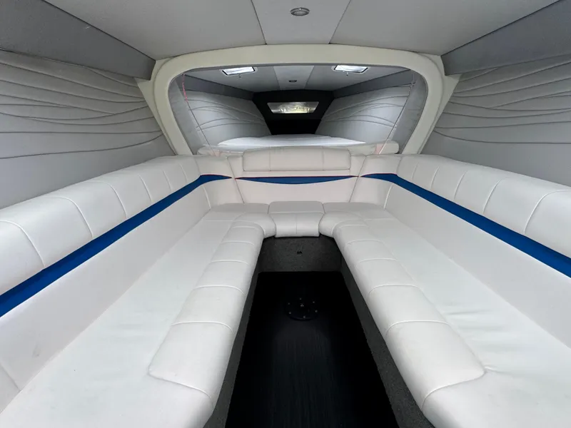 Slide: The Image of Interior of 2020 Formula 382 FASTech boat with white and blue seating. - 21
