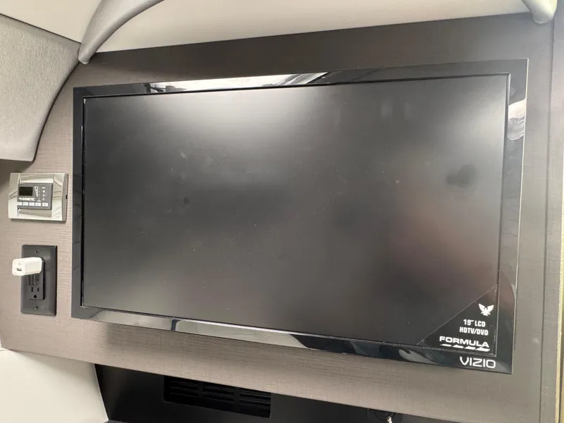 Slide: The Image of 19" Vizio LCD TV in 2020 Formula 382 FASTech boat interior. - 22