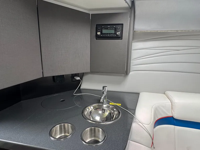 Slide: The Image of Interior of 2020 Formula 382 FASTech boat with sink and seating area. - 24