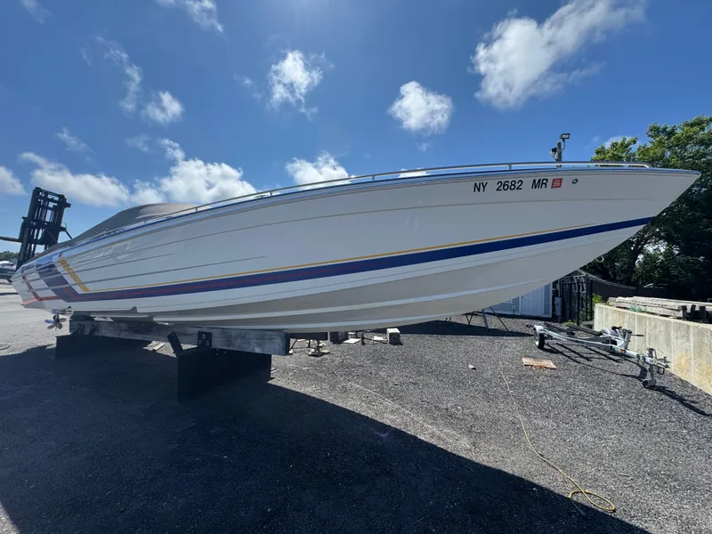 Slide: The Image of 2020 Formula 382 FASTech boat on dry dock under clear blue sky. - 9