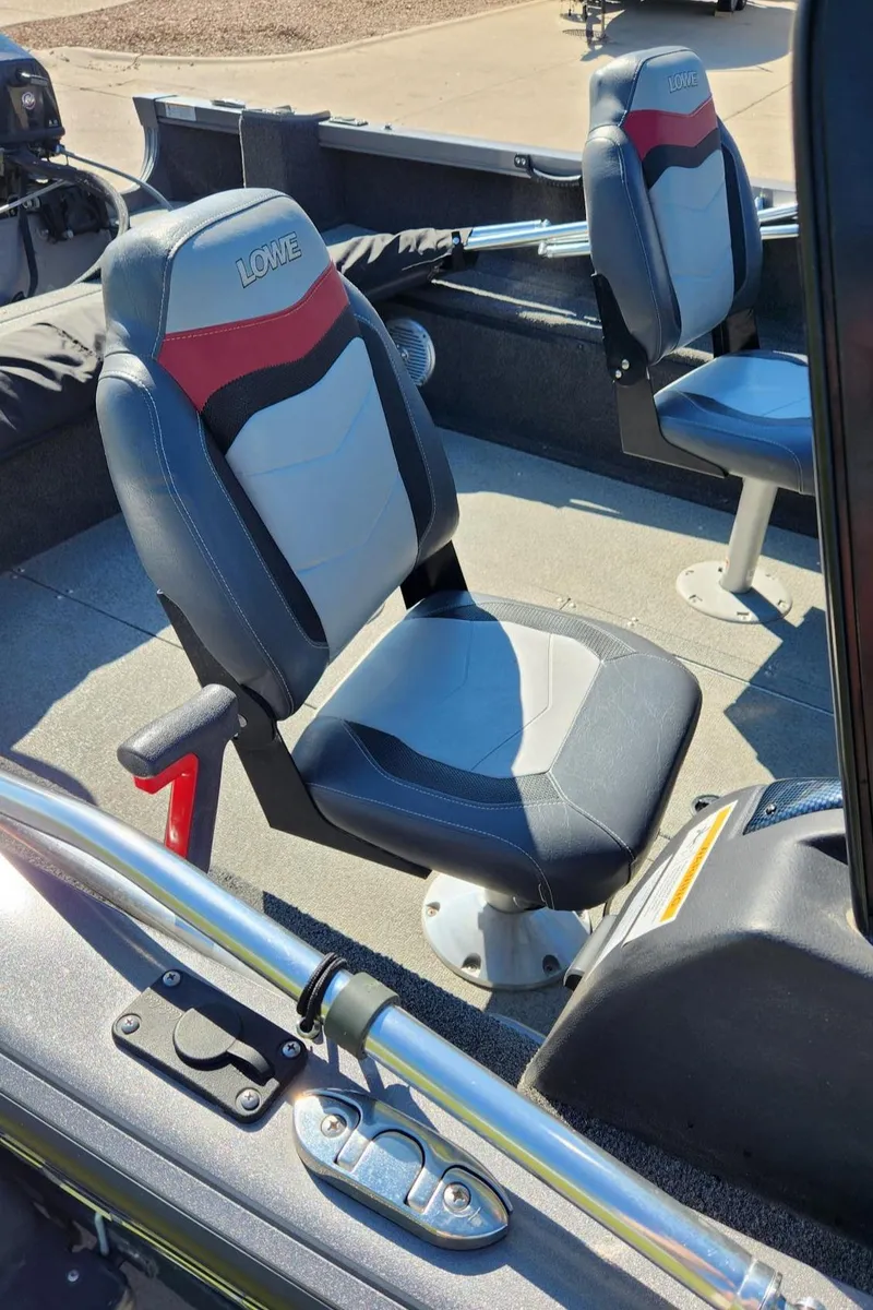 Slide: The Image of 2017 Lowe FM 1710 Pro WT boat interior with two cushioned seats. - 15