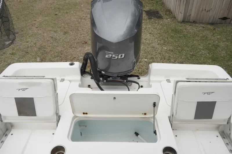 Slide: The Image of 2012 Tidewater 2200 Carolina Bay boat with Yamaha 250 engine, rear view. - 14