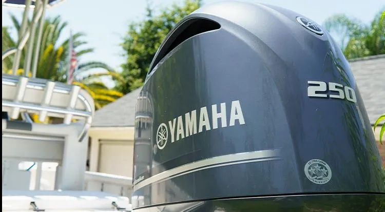 Slide: The Image of Yamaha 250 outboard motor on 2012 Tidewater 2200 Carolina Bay boat, outdoor setting. - 2