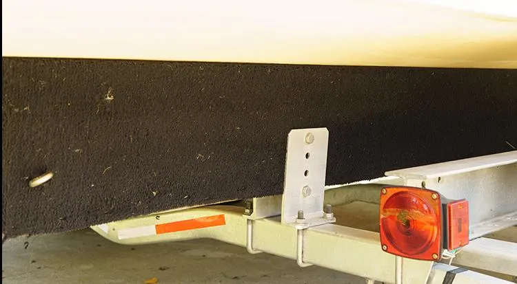 Slide: The Image of Trailer with Tidewater 2200 Carolina Bay boat, 2012 model, featuring red tail light. - 5